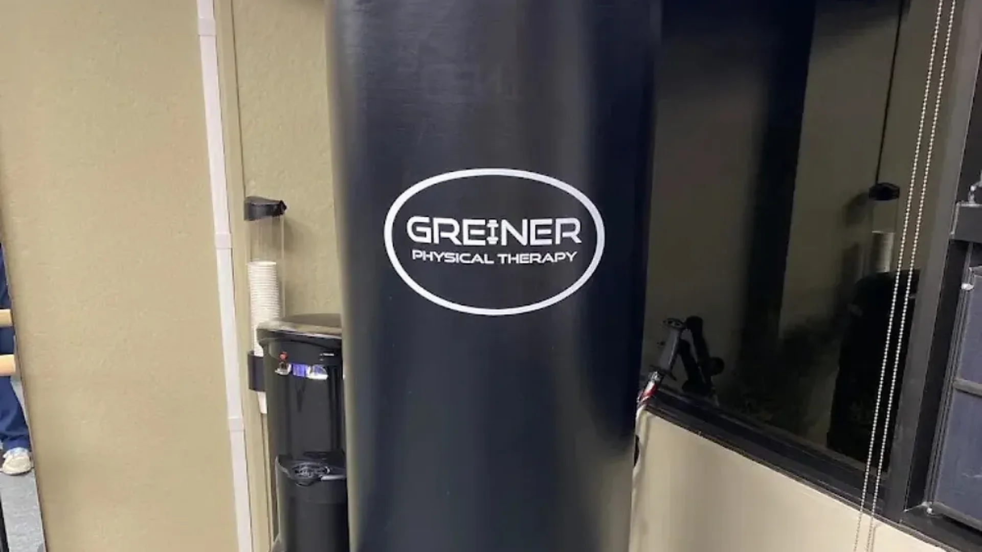 A Greiner Physical Therapy branded heavy bag inside the Speonk clinic